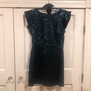 Emerald green with navy detail sequin dress.